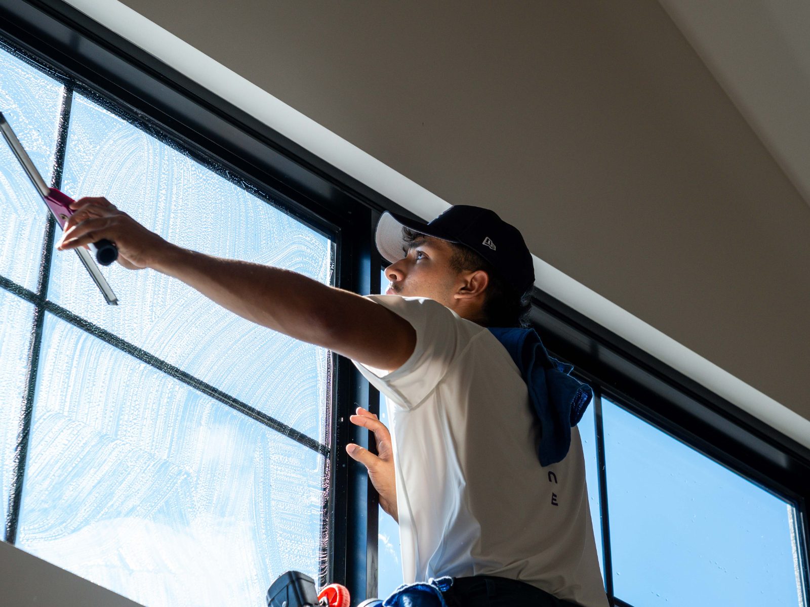 Streak-free window cleaning crew at work on a Sydney home